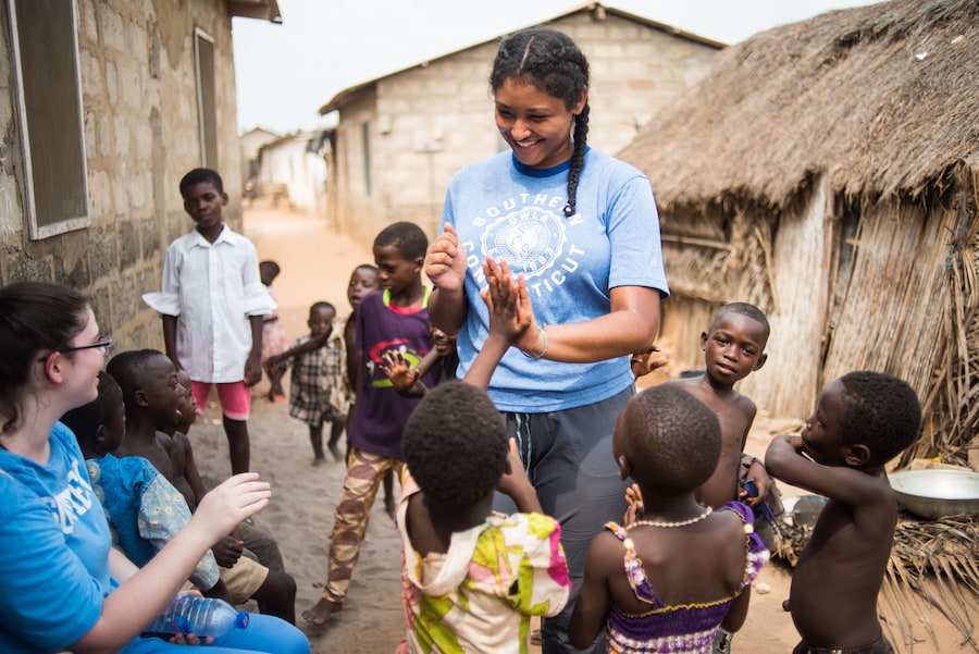 SCSU students with residents in Ghana