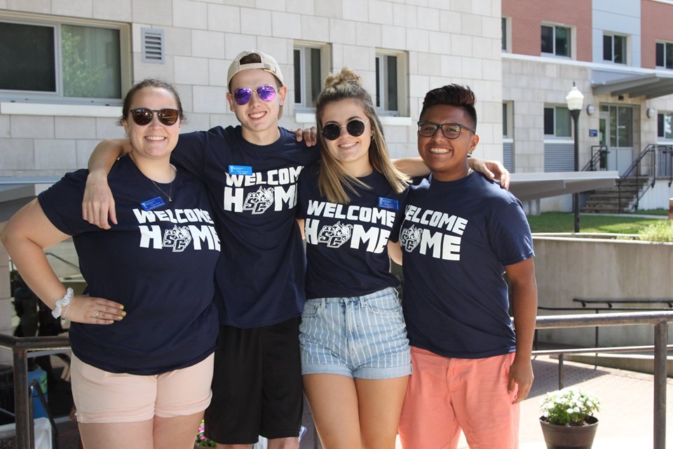 Four Southern students standing together outside of Farnham hall