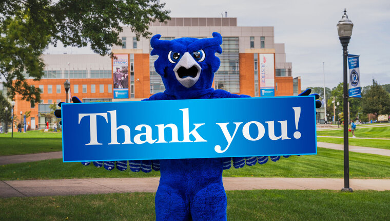 Otis the owl holding a thank you sign