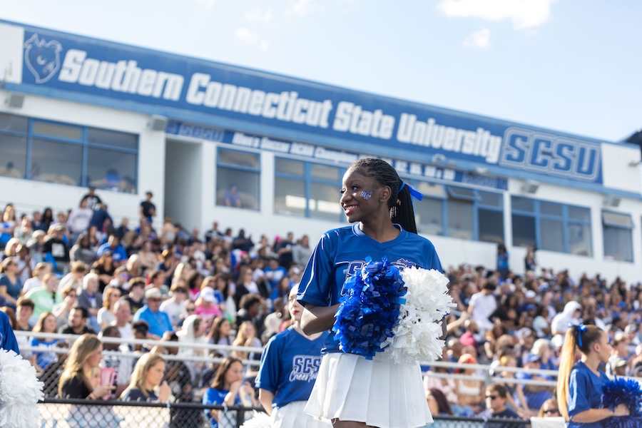 Cheerleader with a crowd