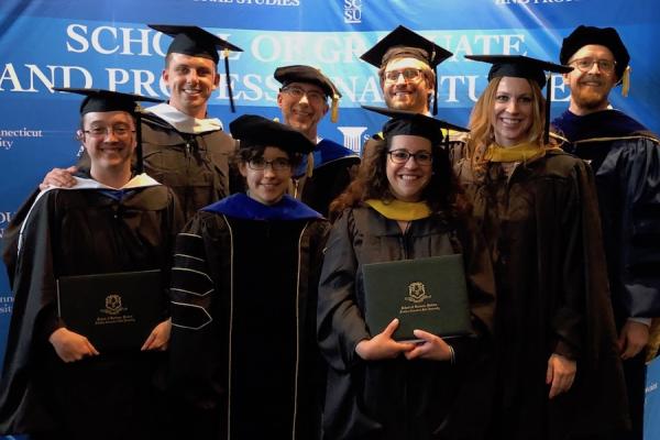 Photo of English MA, MS, and MFA students at 2019 Graduate Commencement