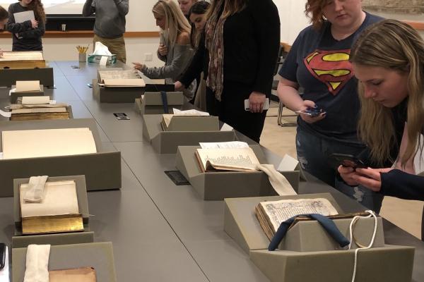 Southern Students Looking at Books at the Beinecke