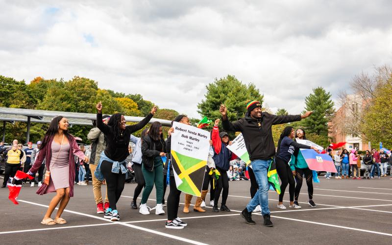 students dancing in a parking lot