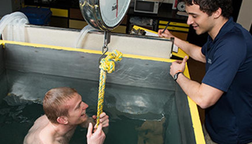 Photograph of Person in Hydrostatic Weighing Tank