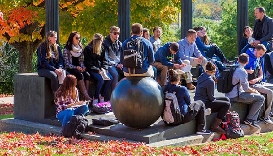 Students on SCSU campus sitting together