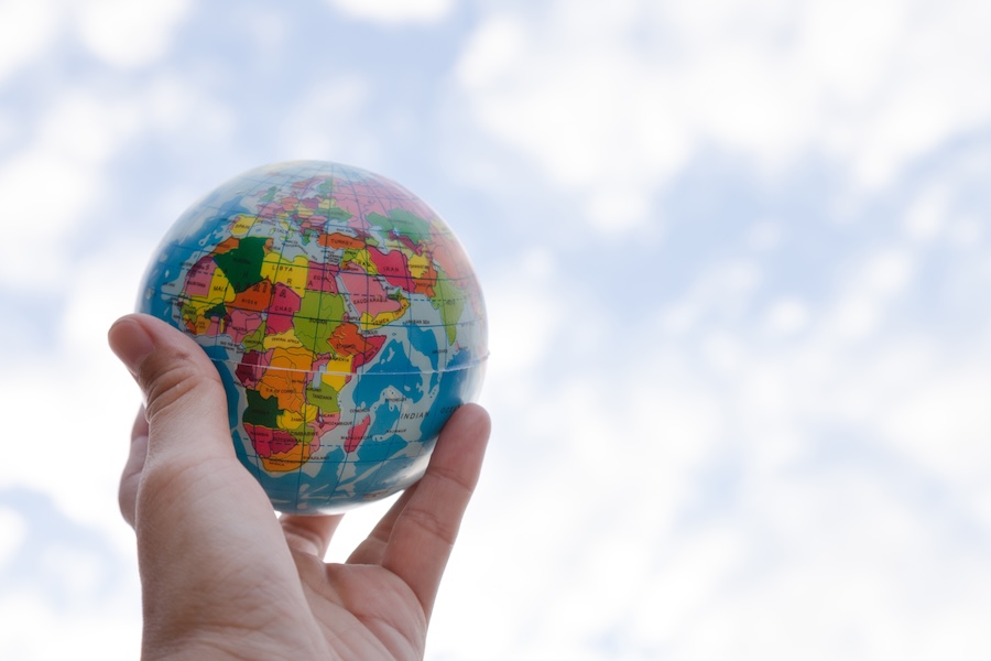 Globe in hand